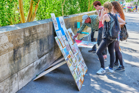 PARIS, FRANCE - JULY 06, 2016 : Street of artists on the River Seine in most beautiful cities in the...