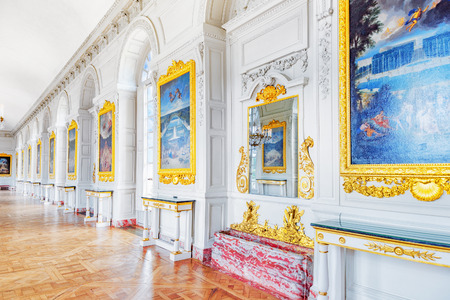 VERSAILLES, FRANCE - JULY 02, 2016 : White gallery with painting in the Grand Trianon. Chateau de Versailles. France.のeditorial素材