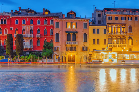Views of the most beautiful canal of Venice - Grand Canal water streets, boats, gondolas, mansions along. Night view. Italy.の写真素材