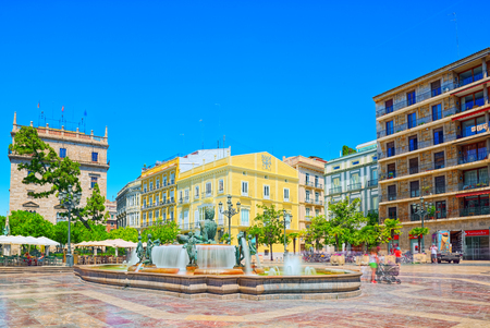 Valencia, Spain - June 13, 2017 : Square of the Virgin Saint Mary near Valencia Cathedral and  fountain Rio Turia. のeditorial素材