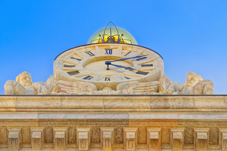 Big clock on building Bank of Spain (Banco de Espana) on Cibeles  Square in the downtown of Madrid, capital of Spain.のeditorial素材