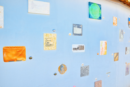 Vilnius, Lithuania - April 12, 2018: Literary Street is one of the oldest streets in Vilnius Old Town, Lithuania. Wall of literary works of art.のeditorial素材