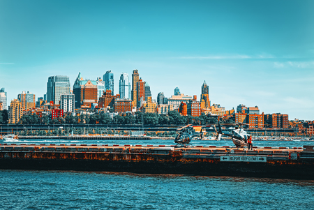 New York,USA - September 04,2017: Lower Manhattan. The launch site for tourist helicopters on the embankment Upper Bay Hudson.のeditorial素材