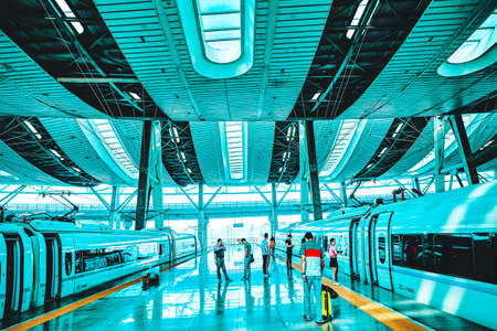 BEIJING, CHINA- MAY 23, 2015: High speed train at the railways station of  Beijing. Speed train is  comfortable and speed and most convenience in China Republic.のeditorial素材