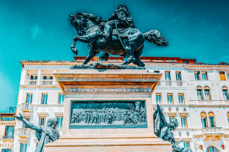 Embankment of the Grand Canal with tourist near  Doge's Palace. The Victor Emmanuel II Monument( Monumento Nazionale a Vittorio Emanuele II).Italy.のeditorial素材