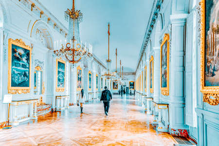 VERSAILLES, FRANCE - JULY 02, 2016 : White gallery with painting in the Grand Trianon. Chateau de Versailles. France.のeditorial素材