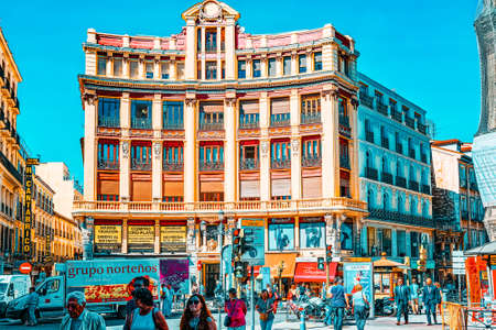 Madrid, Spain- June 06, 2017: Street of Madrid in the downtown of the city with tourists and people. Madrid-capital of Spain and one of the most beautiful cities in the world.のeditorial素材