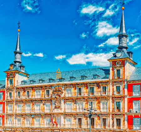 Plaza Mayor (English- Main Square) with tourists and people,  was built during Philip III's reign (1598â1621) and is a central plaza in the city of Madrid, Spain.のeditorial素材