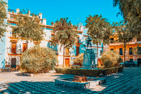 Square of Pilate (Plaza de Pilatos) and Zurbaran statue (Estatua de Zurbaran) in Seville, Spain.の写真素材