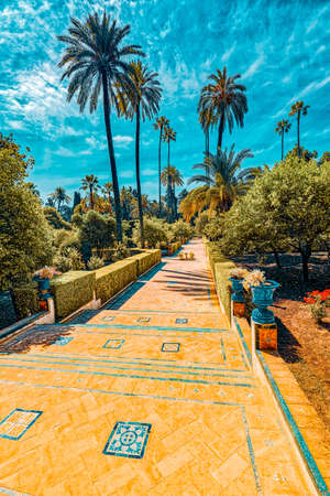 Seville, Spain - June 09, 2017 : View of big and beautiful garden - Gardens of Royal Alcazar in Seville and Grotto Gallery ( Galeria de los Grutescos).のeditorial素材