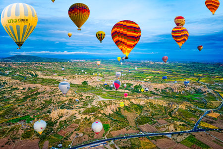 Cappadocia, Turkiye - July 07, 2023-Air balloons in Cappadocia-amazing and unreal views in valley.