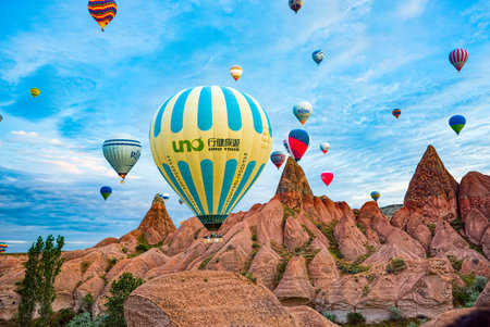 Cappadocia, Turkiye - July 07, 2023-Air balloons in Cappadocia-amazing and unreal views in valley.