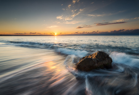 Sunrise, at time, when the beach is so calm. You can walk around, enjoy the nature and feel freeの写真素材