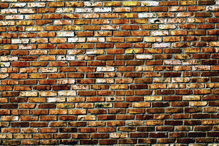Old grunge brick wall backgroundの写真素材