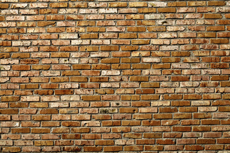 Old grunge brick wall backgroundの写真素材