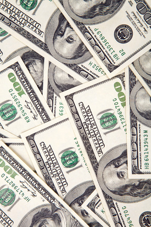 dollars on white backgroundの写真素材
