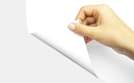 One human hand open white page of paperの写真素材