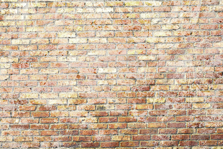 Old grunge brick wall backgroundの写真素材