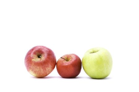 Close up of red apple slice isolated on white backgroundの写真素材