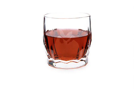 Glass of red wine on a white backgroundの写真素材