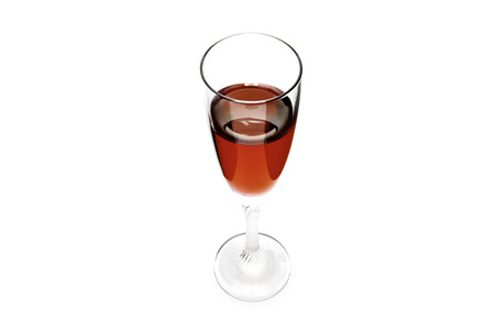 Glass of red wine on a white backgroundの写真素材