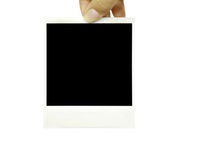 Two photo card in hand isolated on white backgroundの写真素材