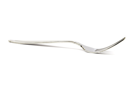 The silver plug and knife isolated on whiteの写真素材