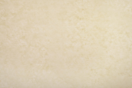 Old yellow paper textureの写真素材