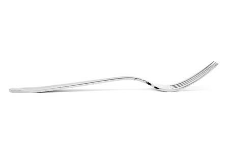 The silver fork isolated on whiteの写真素材