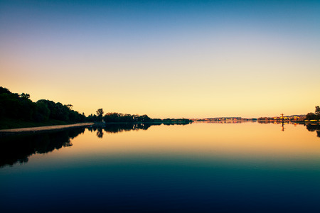 Picturesque forest and the riverの写真素材