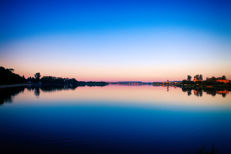 Picturesque forest and the riverの写真素材