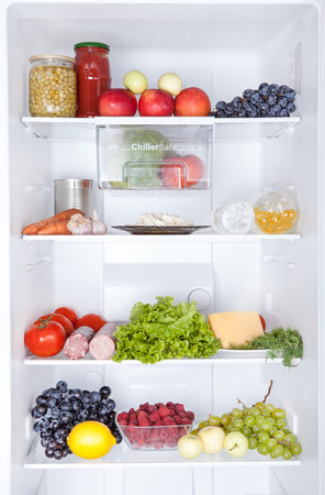Refrigerator full of foodの写真素材