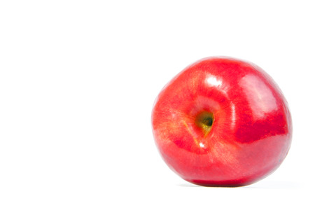 juicy red apples isolated on whiteの写真素材