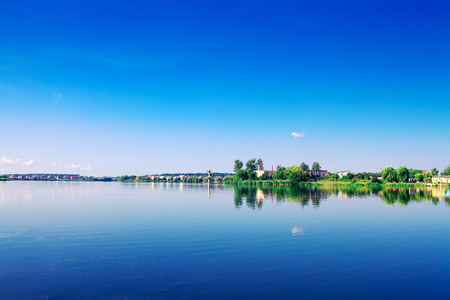 Picturesque forest and the riverの写真素材