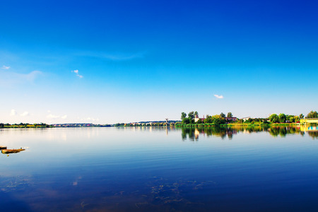 Picturesque forest and the riverの写真素材