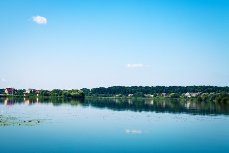 Picturesque forest and the riverの写真素材
