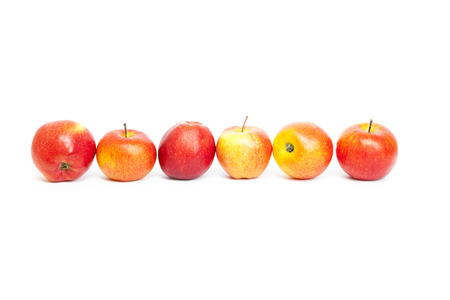 juicy red apples isolated on whiteの写真素材