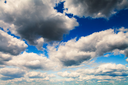 Blue sky with white clouds backgroundの写真素材