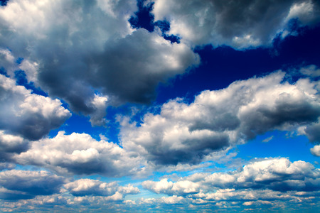 Blue sky with white clouds backgroundの写真素材