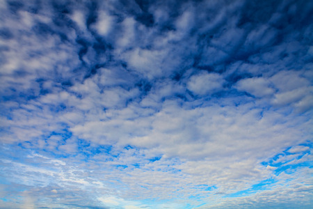 Blue sky with white clouds backgroundの写真素材