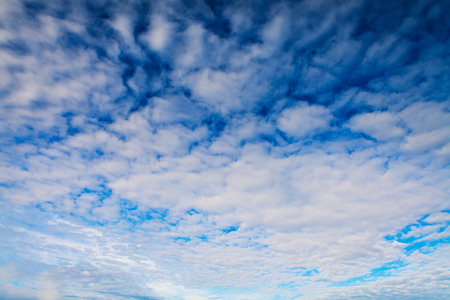 Blue sky with white clouds backgroundの写真素材