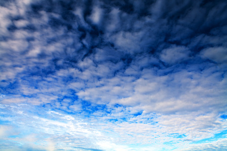 Blue sky with white clouds backgroundの写真素材
