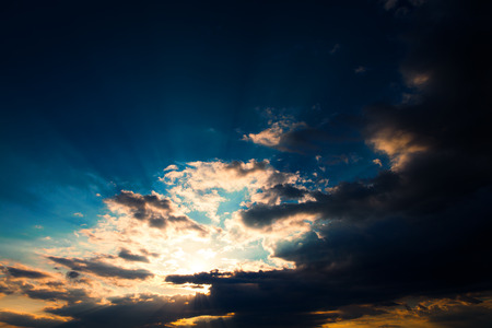 Blue sky with clouds and sunの写真素材