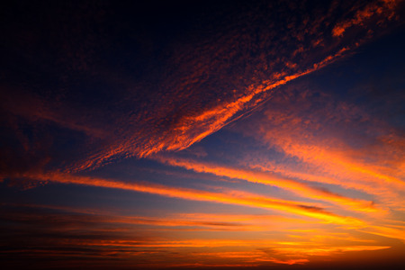 Blue sky with clouds and sunの写真素材