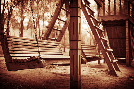 A swinging bench deep in the woods