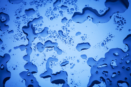 macro water drops on abstract backgroundの写真素材