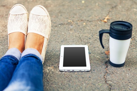 table pc in a hand for a girlの写真素材