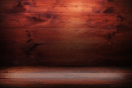 Light on wooden floor in empty roomの写真素材