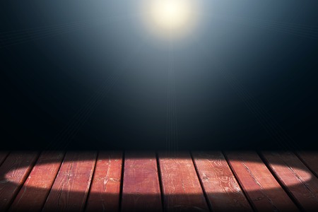 Light on wooden floor in empty room