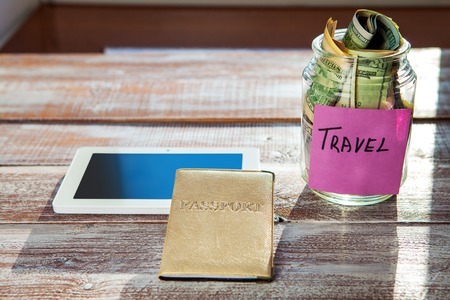 objects for travel isolated on a wooden backgroundの写真素材